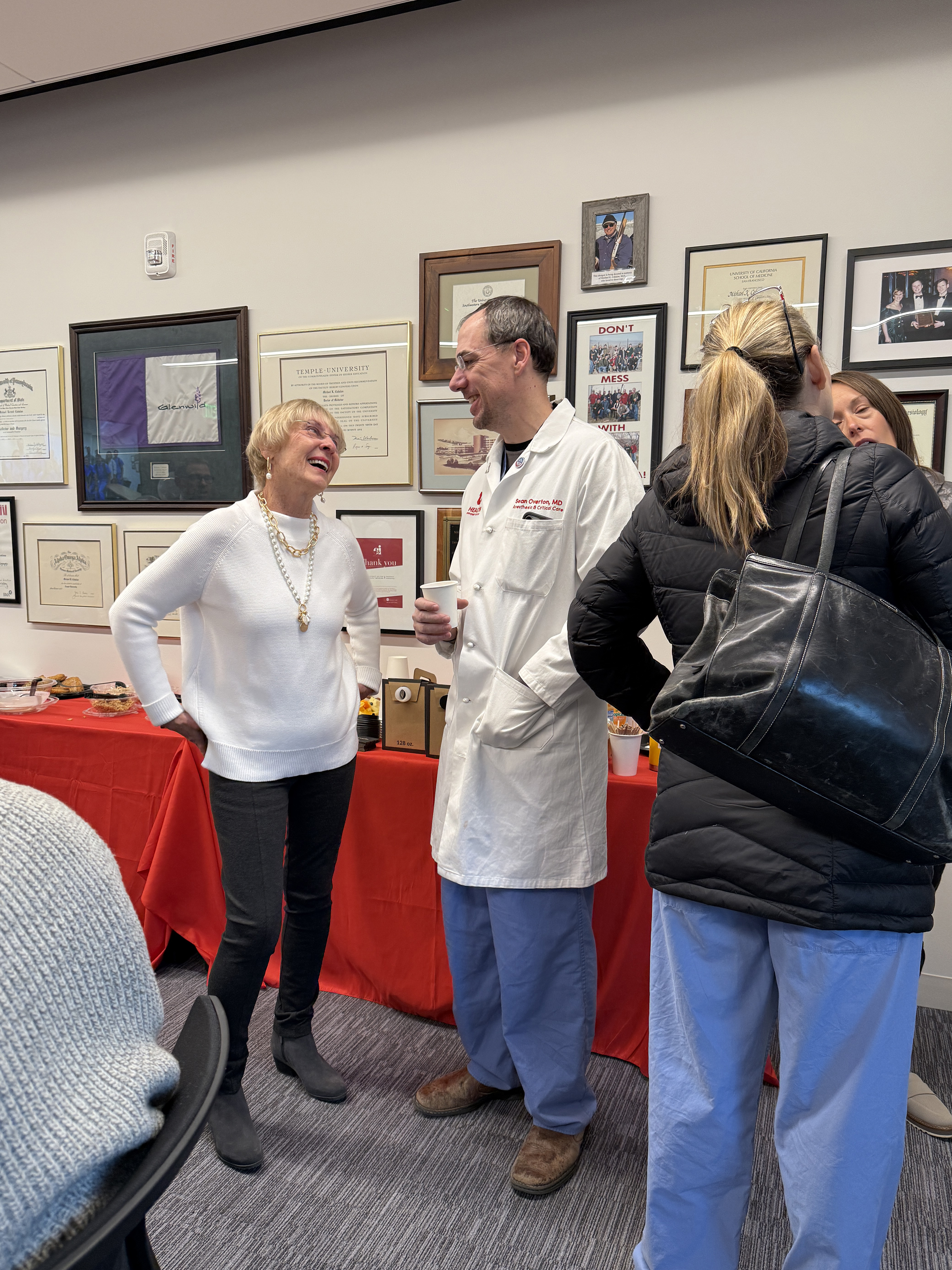 Marianne Cahalan and Dr. Sean Overton chatting at the dedication. 